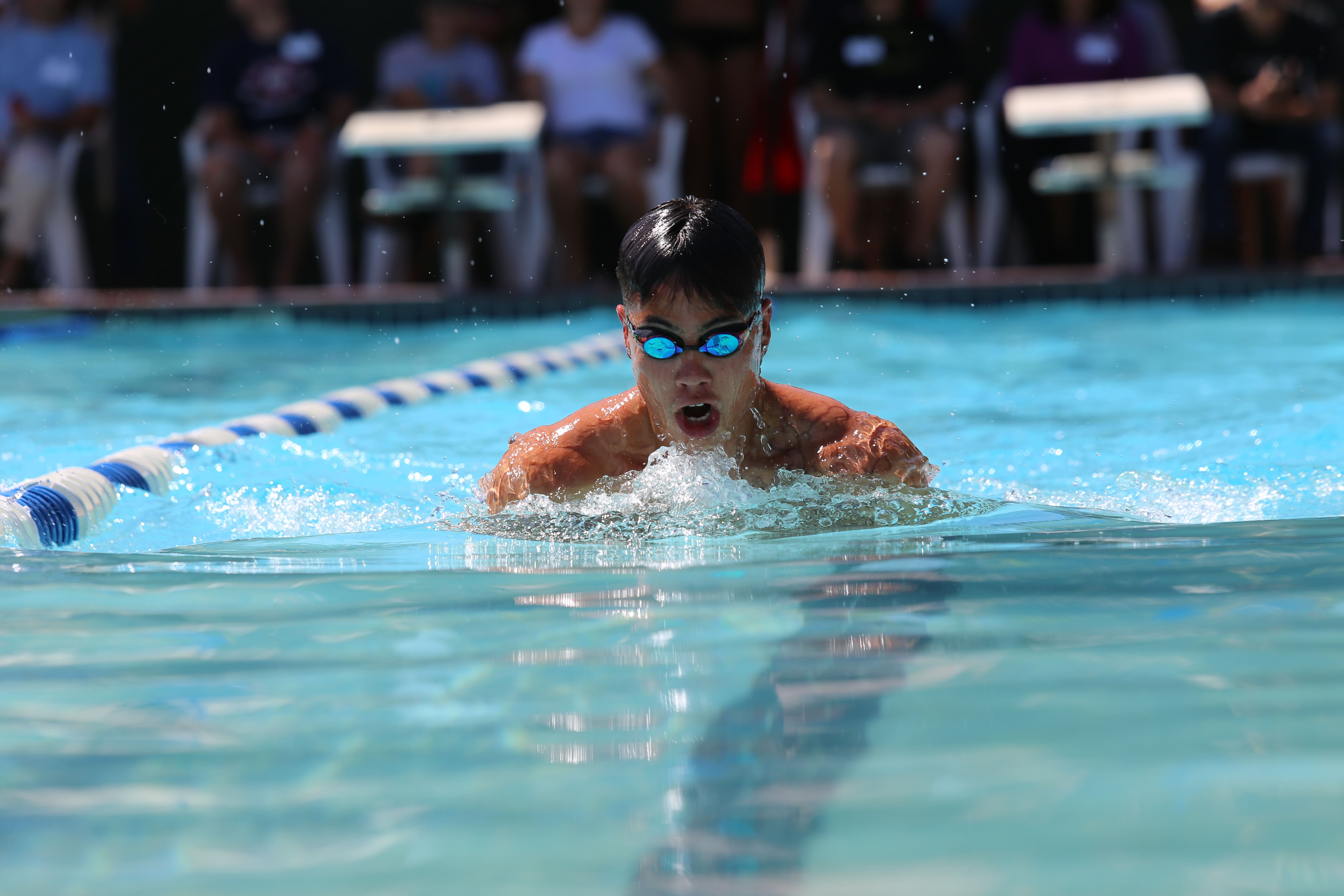 A swimmer swimming breaststroke